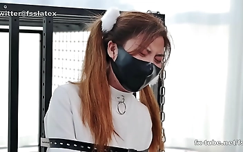 Get Tied Up in Lust with a Sexy Asian Enchantress in a Fierce Latex Catsuit and Straitjacket Bondage