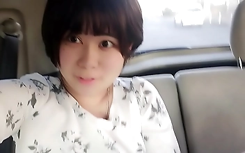 Japanese Slut Goes Wild in her Car Fingering Herself to Orgasm!!