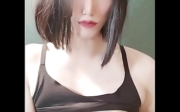 Japanese Sissy Stuns with Enchanting Beauty and Alluring Figure