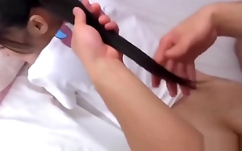 Who's the Luscious JAV Enchantress in this Video? Discover the Alluring MILF's Seductive Charm